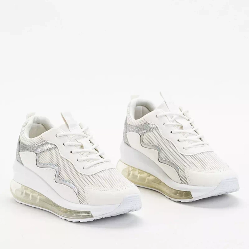 OUTLET Кремове жіноче спортивне взуття на танкетці Runiso - Взуття