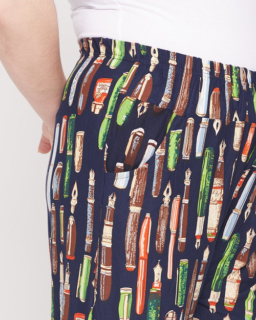 Темно-сині жіночі штани з візерунком - Одяг