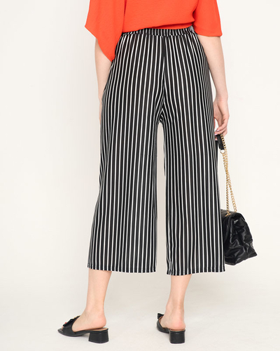 Жіночі штани в чорно-білу смужку - Одяг