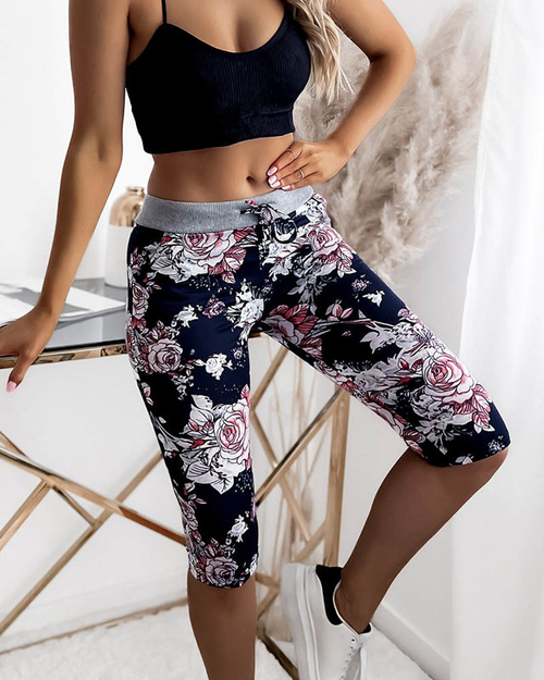 Жіночі шорти 3/4 з квітковим принтом темно-синього та коралового кольорів PLUS SIZE - Одяг