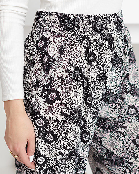 Чорно-білі жіночі штани PLUS SIZE з малюнком - Одяг