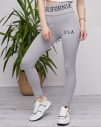 Легінси жіночі світло-сірі в рубчик з написами - Clothing