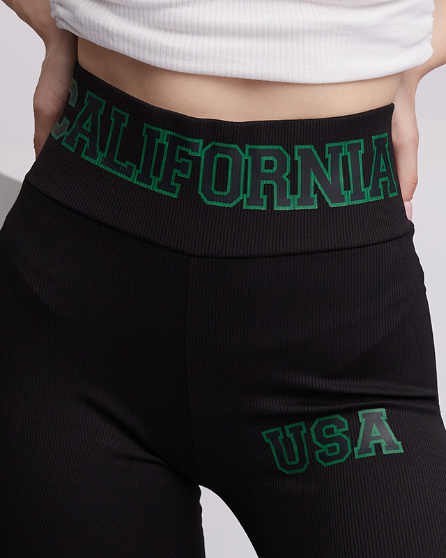 Schwarze Ripp-Leggings für Damen mit grünen Zeichen - Kleidung
