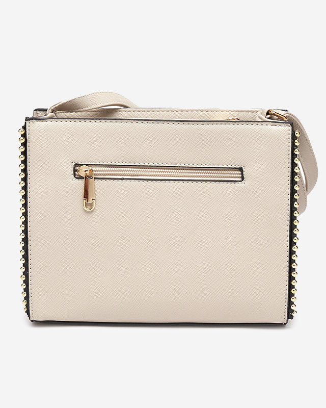 Klassische beige Handtasche mit Dekoration - Accessoires
