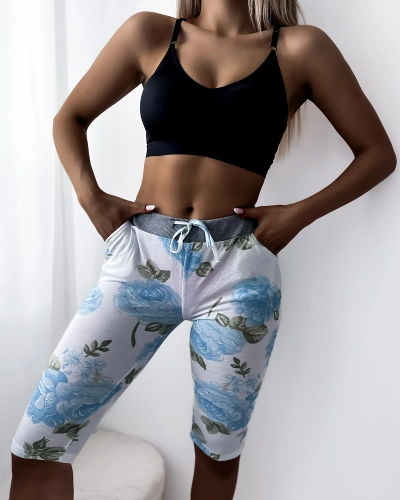 Weiße 3/4-Shorts für Damen mit blauen Blumen - Kleidung