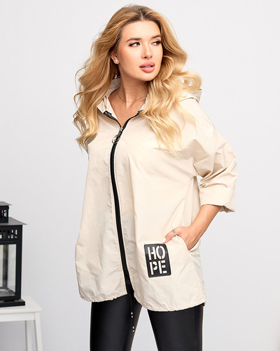 Beige lange Damen-Windjacke mit Aufnäher - Kleidung