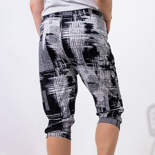 Чорні жіночі штани 3/4 PLUS SIZE з малюнком - Одяг