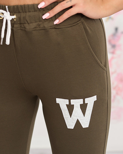 Dunkelgrüne Damen-Jogginghose mit farbigem Aufnäher - Kleidung
