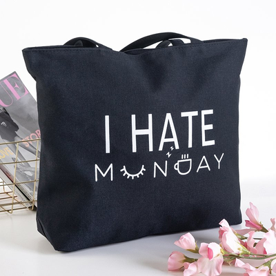 Schwarze Umhängetasche mit Aufdruck - Handtaschen