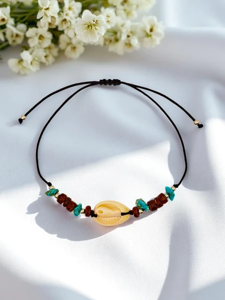 Damenarmband mit Ozeanien-Muschel Zeit