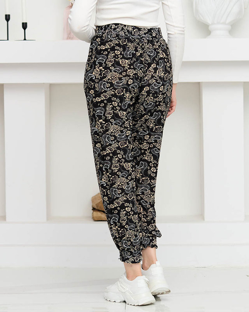 Чорні жіночі штани з бежевим принтом PLUS SIZE - Одяг