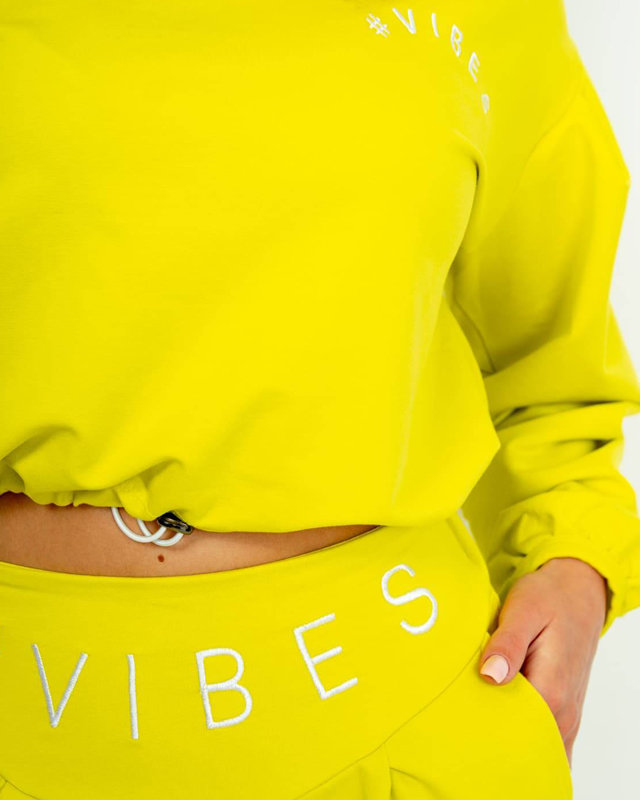 Gelber Sport-Trainingsanzug für Damen mit Crop-Top-Sweatshirt - Kleidung