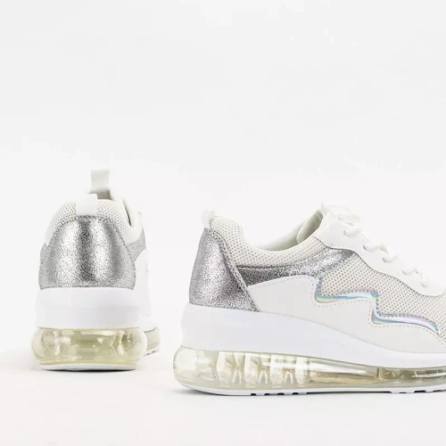 OUTLET Кремове жіноче спортивне взуття на танкетці Runiso - Взуття