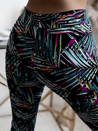 Чорно-бірюзові жіночі легінси з принтом - Одяг