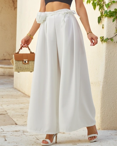 Royalfashion Elegante weite Damenhose mit einem dekorativen Blumenmuster am Gürtel