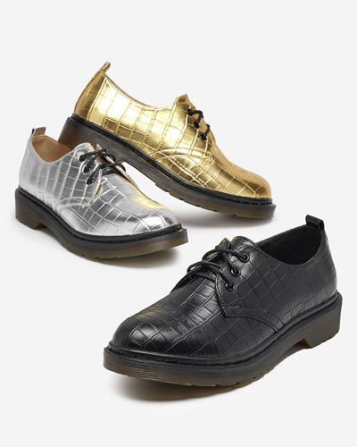 Goldener Damenschuh mit Seniri-Prägung - Schuhe
