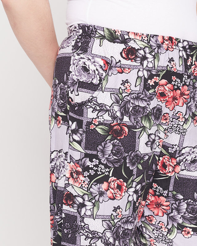 Gemusterte schwarze und lila Damenhose - Kleidung