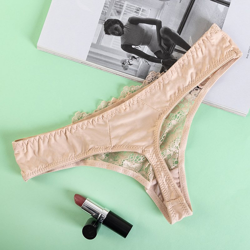 Бежеві жіночі стрінги з мереживом