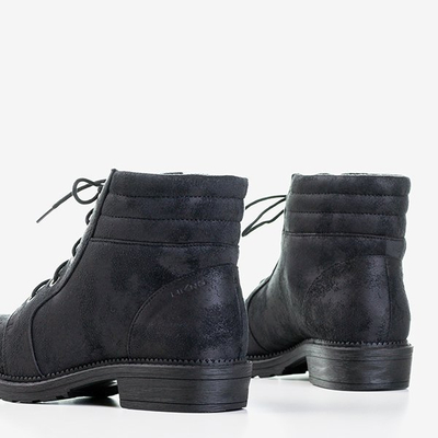 Schwarze Frauentaschen mit dekorativem Abrieb Tusyon - Schuhe