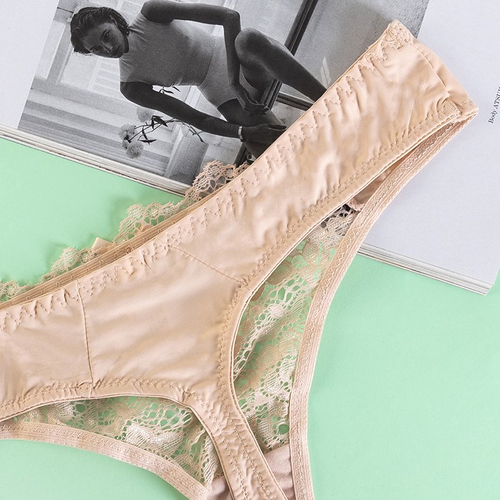 Бежеві жіночі стрінги з мереживом