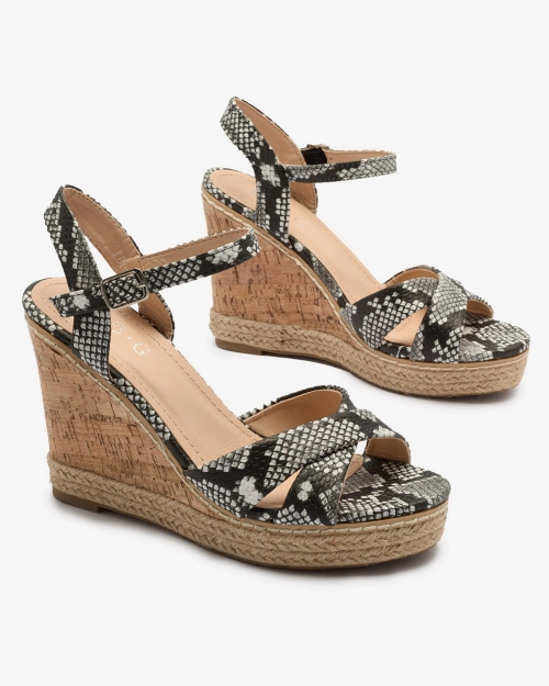 Чорно-білі жіночі босоніжки на танкетці з тисненням Certika - Взуття