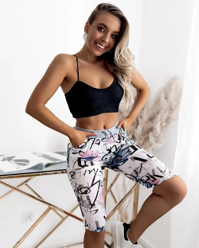 Біло-сині жіночі шорти 3/4 з принтом PLUS SIZE - Одяг