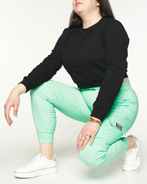 Жіночі штани кольору м'яти з кишенями PLUS SIZE
