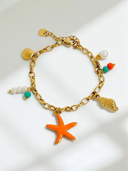 Callista Mare Armband – goldene Kette mit Muscheln und Seestern