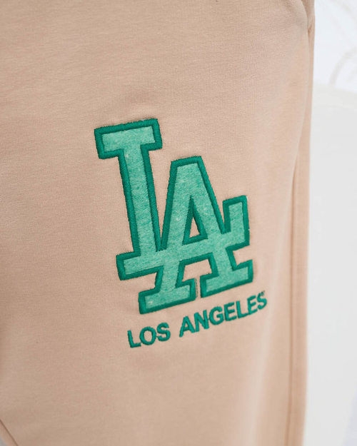 Жіночі бежеві спортивні штани з кольоровою нашивкою - Одяг