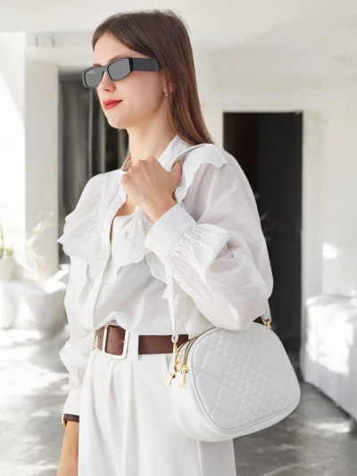 Royalfashion Kleine ovale Handtasche für Frauen aus ökologischem Leder