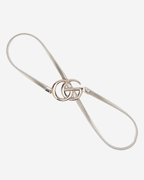 Сріблястий еластичний жіночий ремінь на застібці з буквами