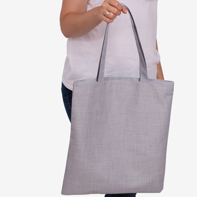 Graue Stofftasche mit der Aufschrift - Zubehör