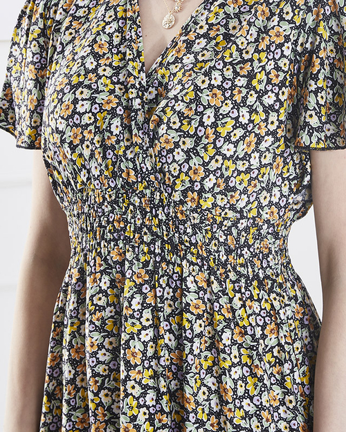 Жіноча квіткова сукня міді чорного кольору - Одяг