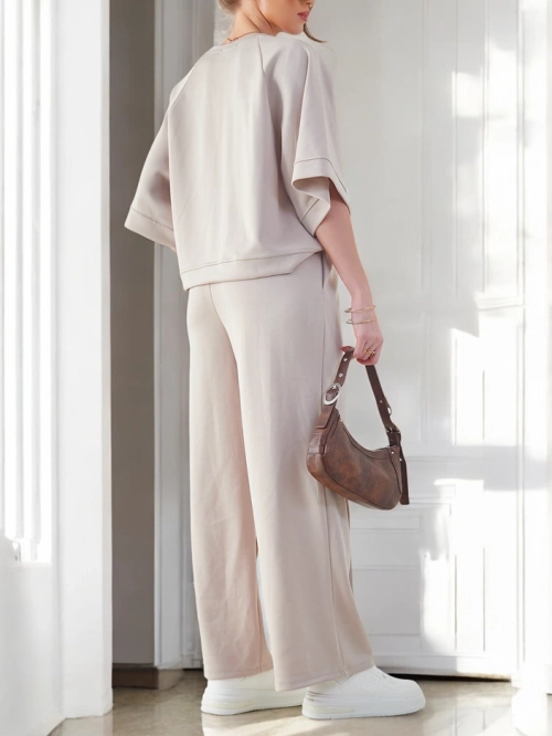 Royalfashion Жіночий комплект з короткими рукавами та розкльошеними штанами