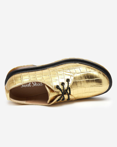 Goldener Damenschuh mit Seniri-Prägung - Schuhe
