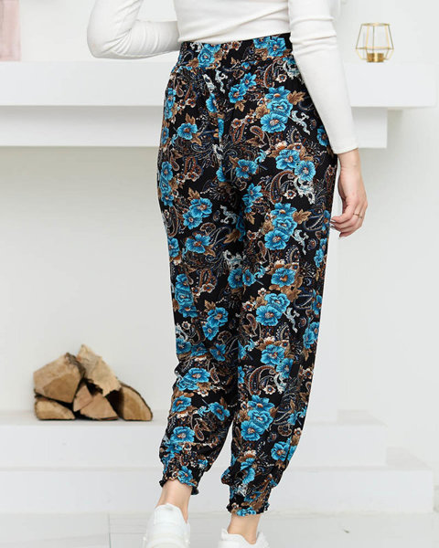 Чорно-бірюзові жіночі штани з квітами PLUS SIZE - Одяг