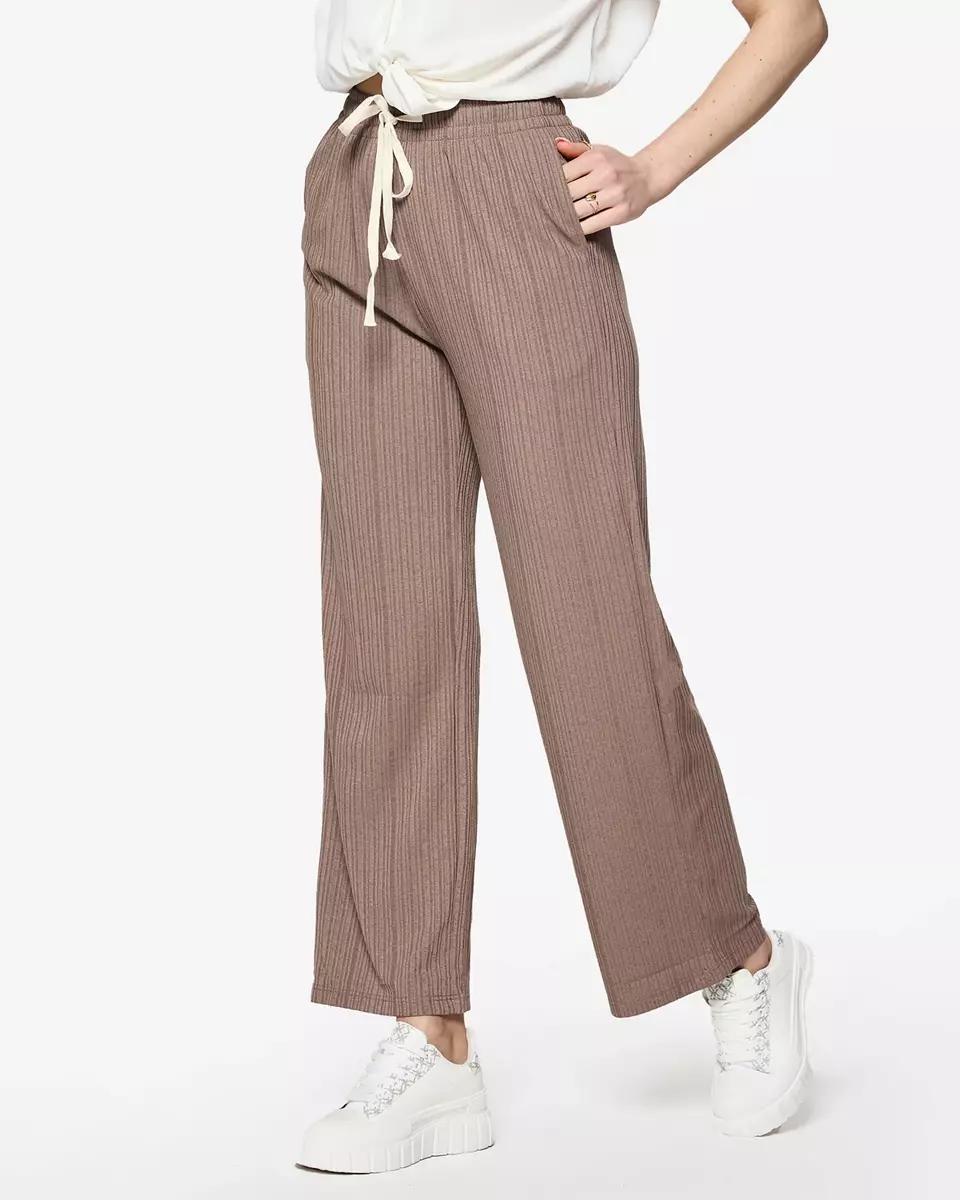 Коричневі жіночі широкі брюки на резинці - одяг