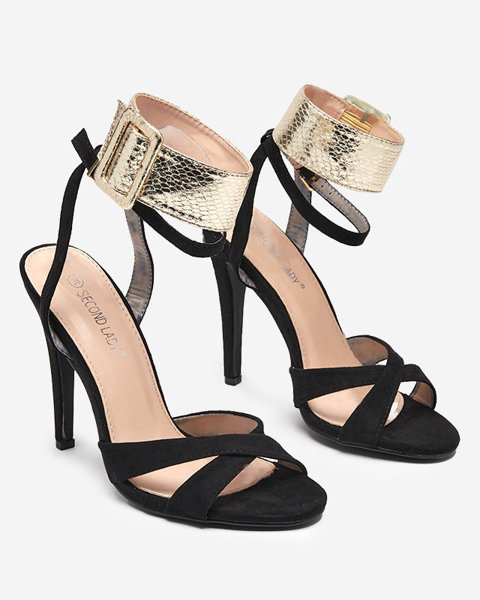 OUTLET Жіночі босоніжки на чорних високих підборах із золотистою смужкою Magnessias - Взуття