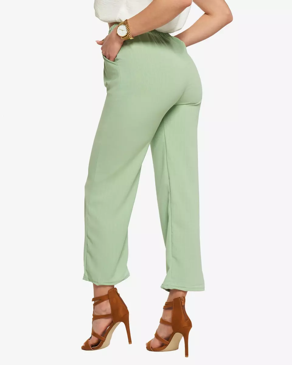 Зелені жіночі широкі штани з тканини - Одяг