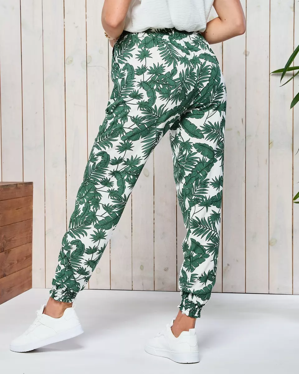 Зелені жіночі тканинні штани а-ля Алладін з квітковим візерунком - Одяг