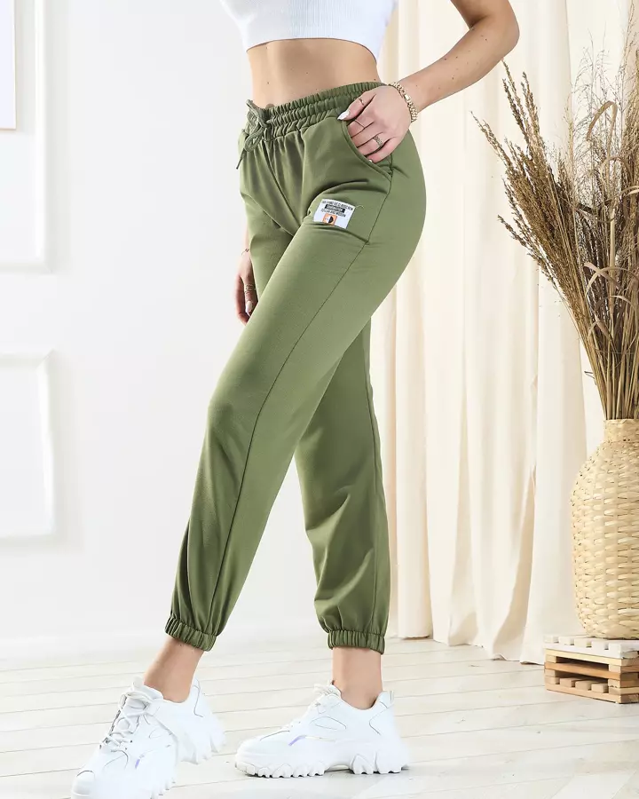 Жіночі зелені спортивні штани - Одяг